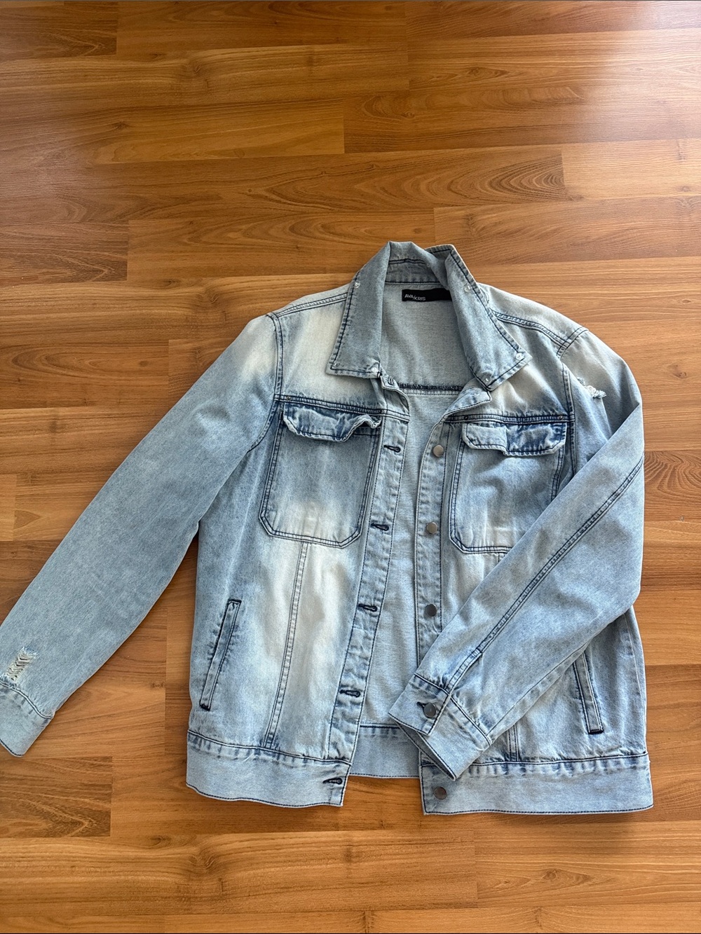 Akris Light Wash Denim Trucker Jacket